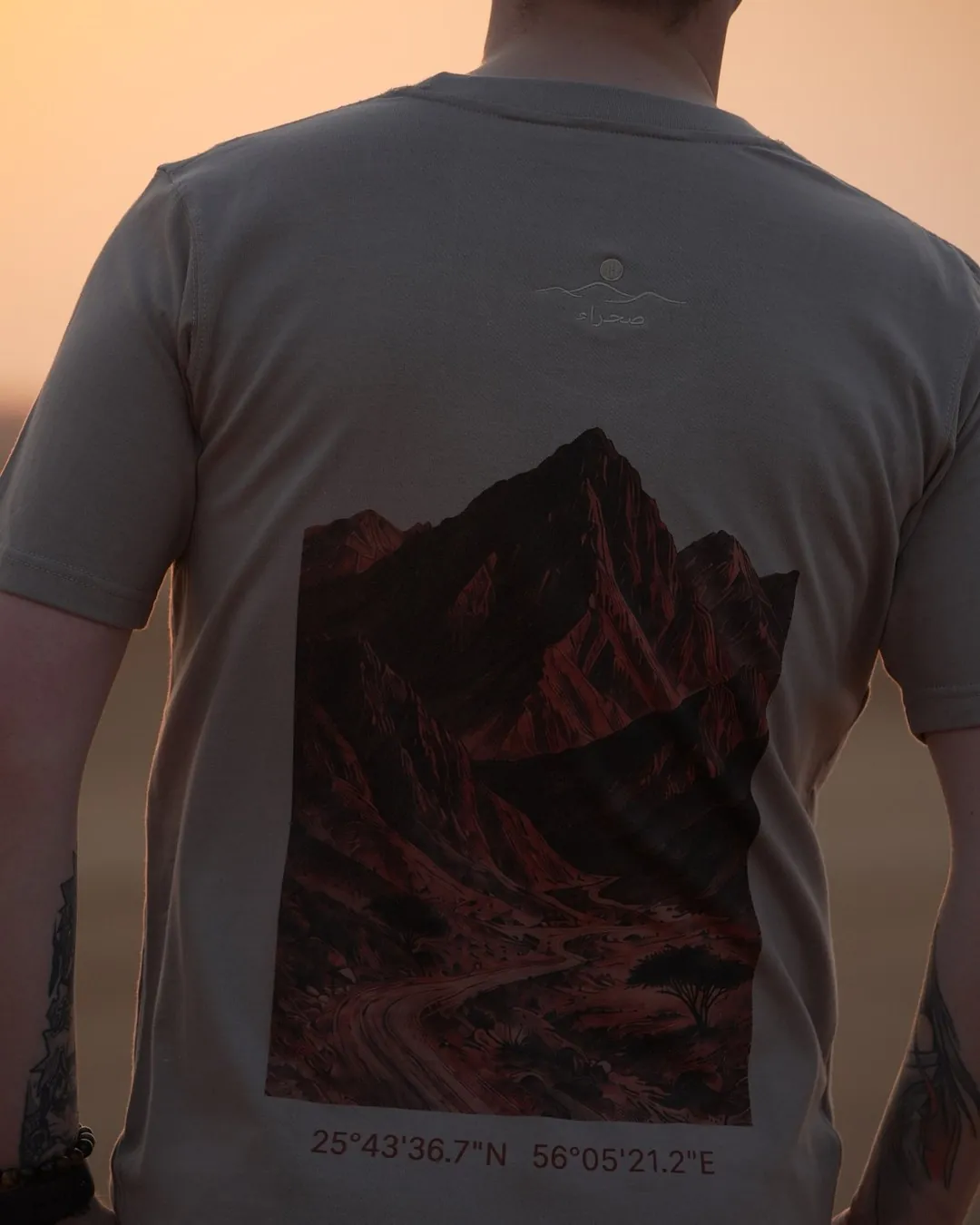 Hajar Mountains — Regular, regular fit, worn in the dunes — the design across the back